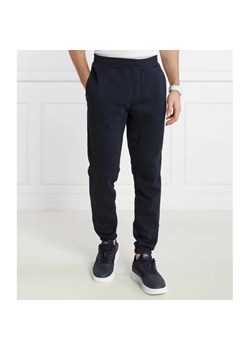 Tommy Hilfiger Spodnie dresowe GLOBAL STRIPE | Regular Fit ze sklepu Gomez Fashion Store w kategorii Spodnie męskie - zdjęcie 185005525