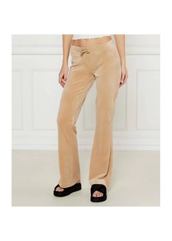 Juicy Couture Spodnie dresowe CHRISTINE | flare fit | low rise ze sklepu Gomez Fashion Store w kategorii Spodnie damskie - zdjęcie 185008025