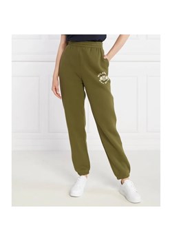 Tommy Hilfiger Spodnie dresowe VARSITY FLOCK | Relaxed fit ze sklepu Gomez Fashion Store w kategorii Spodnie damskie - zdjęcie 185010079