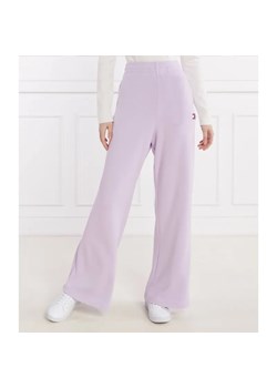Tommy Jeans Spodnie dresowe BADGE WIDE EXT | flare fit ze sklepu Gomez Fashion Store w kategorii Spodnie damskie - zdjęcie 185012316