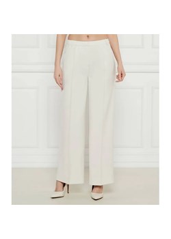 Calvin Klein Spodnie | flare fit | mid rise ze sklepu Gomez Fashion Store w kategorii Spodnie damskie - zdjęcie 185014309