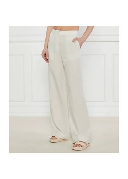 Calvin Klein Spodnie | flare fit | z dodatkiem lnu ze sklepu Gomez Fashion Store w kategorii Spodnie damskie - zdjęcie 185014765