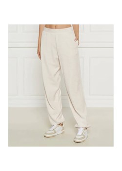 Juicy Couture Spodnie dresowe DAVIDSON GOLD | Relaxed fit ze sklepu Gomez Fashion Store w kategorii Spodnie damskie - zdjęcie 185028895