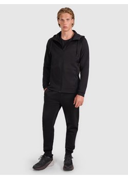 Męskie spodnie treningowe 4F 4FWAW25TFTRM0936 - czarne ze sklepu Sportstylestory.com w kategorii Spodnie męskie - zdjęcie 185049806