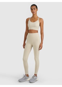 Damskie legginsy treningowe 4F 4FRAW25TFTIF445 - beżowy ze sklepu Sportstylestory.com w kategorii Spodnie damskie - zdjęcie 185050007