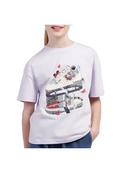 Koszulka dziecięca New Balance LAKG0117RIG - fioletowa ze sklepu streetstyle24.pl w kategorii Bluzki dziewczęce - zdjęcie 185057315