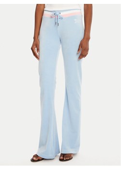 Juicy Couture Spodnie dresowe Velour JCWBJ225352 Błękitny Regular Fit ze sklepu MODIVO w kategorii Spodnie damskie - zdjęcie 185066907