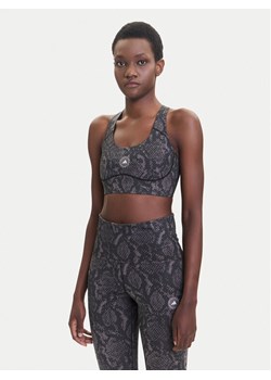 adidas by Stella McCartney Biustonosz sportowy Power Impact JW4542 Brązowy Slim Fit ze sklepu MODIVO w kategorii Biustonosze - zdjęcie 185371816