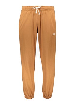 New Balance Spodnie dresowe &quot;Athletics Remastered&quot; w kolorze jasnobrązowym ze sklepu Limango Polska w kategorii Spodnie męskie - zdjęcie 185388725