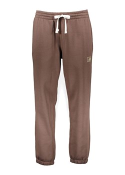 New Balance Spodnie dresowe "Essentials Brushed" w kolorze jasnobrązowym ze sklepu Limango Polska w kategorii Spodnie męskie - zdjęcie 185388729