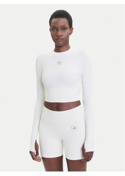 adidas by Stella McCartney Koszulka techniczna Training JM1403 Beżowy Slim Fit ze sklepu MODIVO w kategorii Bluzki damskie - zdjęcie 185391165
