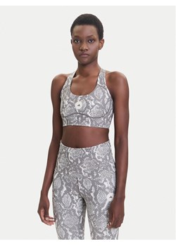 adidas by Stella McCartney Biustonosz sportowy Power Impact JM6092 Beżowy Slim Fit ze sklepu MODIVO w kategorii Biustonosze - zdjęcie 185391219