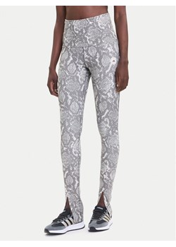 adidas by Stella McCartney Legginsy Training Rolltop Splitcuff JM8477 Beżowy Slim Fit ze sklepu MODIVO w kategorii Spodnie damskie - zdjęcie 185411808