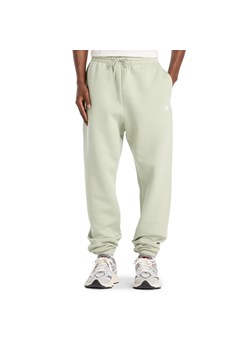Spodnie męskie New Balance MP41503GAS - miętowe ze sklepu streetstyle24.pl w kategorii Spodnie męskie - zdjęcie 185429356
