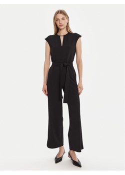 Calvin Klein Kombinezon LV044C066G Czarny Regular Fit ze sklepu MODIVO w kategorii Kombinezony damskie - zdjęcie 185441839