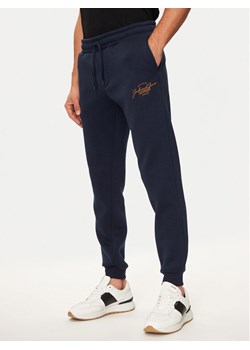 Jack&Jones Spodnie dresowe Gordon 12258491 Granatowy Regular Fit ze sklepu MODIVO w kategorii Spodnie męskie - zdjęcie 185444086
