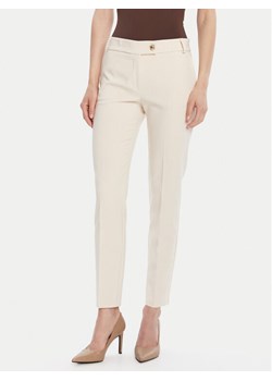 Rinascimento Chinosy CFC0126225003 Beżowy Slim Fit ze sklepu MODIVO w kategorii Spodnie damskie - zdjęcie 185473415