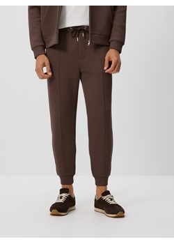 Reserved - Spodnie dresowe slim fit - beżowy ze sklepu Reserved w kategorii Spodnie męskie - zdjęcie 185506288