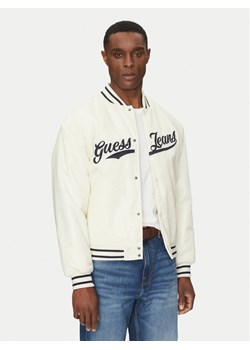 Guess Jeans Kurtka bomber M5RL54 WHAA2 Beżowy Regular Fit ze sklepu MODIVO w kategorii Kurtki męskie - zdjęcie 185519639