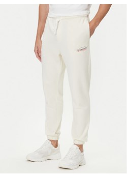 Jack&Jones Spodnie dresowe Kane Billy 12283257 Écru Relaxed Fit ze sklepu MODIVO w kategorii Spodnie męskie - zdjęcie 185521605