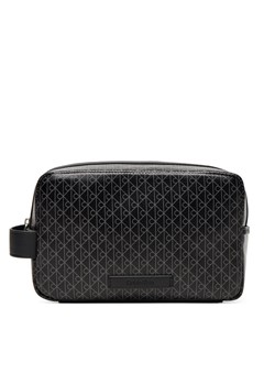 Calvin Klein Kosmetyczka Coated Dopp Kit LV04D1082G Czarny ze sklepu MODIVO w kategorii Kosmetyczki - zdjęcie 185533206