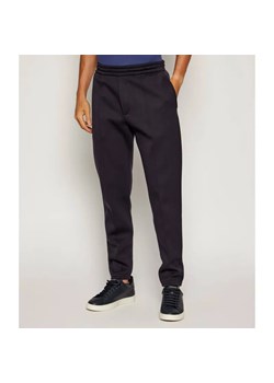 Emporio Armani Spodnie dresowe Travel Essentials | Regular Fit | z dodatkiem wełny ze sklepu Gomez Fashion Store w kategorii Spodnie męskie - zdjęcie 185550308