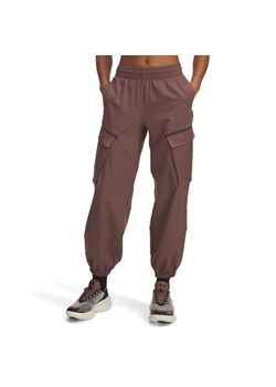 Damskie spodnie treningowe Under Armour Unstoppable Cargo Pant - różowe ze sklepu Sportstylestory.com w kategorii Spodnie damskie - zdjęcie 185581226