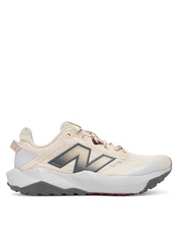 New Balance Buty do biegania Nitrel WTNTRCC6 Beżowy ze sklepu MODIVO w kategorii Buty sportowe damskie - zdjęcie 185588459