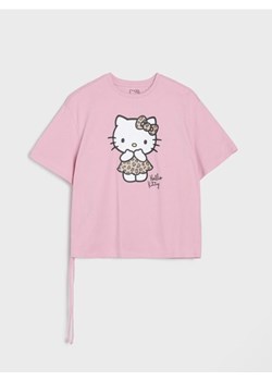 Sinsay - Bawełniana koszulka z nadrukiem Hello Kitty - różowy ze sklepu Sinsay w kategorii Bluzki dziewczęce - zdjęcie 185599875