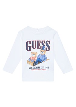 Guess Bluzka I5BI00I3Z14 Biały Regular Fit ze sklepu MODIVO w kategorii T-shirty chłopięce - zdjęcie 185679227
