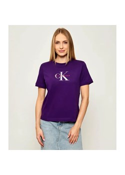Calvin Klein Jeans T-shirt HERO | Regular Fit ze sklepu Gomez Fashion Store w kategorii Bluzki damskie - zdjęcie 185683857