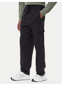 adidas Spodnie dresowe ALL SZN French Terry JN0580 Czarny Loose Fit ze sklepu MODIVO w kategorii Spodnie męskie - zdjęcie 185719855