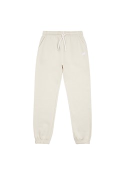 Spodnie dziecięce New Balance LAKG0005LIN – beżowe ze sklepu New Balance Poland w kategorii Spodnie chłopięce - zdjęcie 185752817