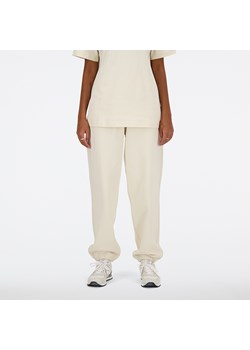 Spodnie damskie New Balance WP41513LIN – beżowe ze sklepu New Balance Poland w kategorii Spodnie damskie - zdjęcie 185753108