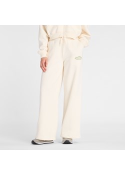 Spodnie damskie New Balance WP53902PEF – beżowe ze sklepu New Balance Poland w kategorii Spodnie damskie - zdjęcie 185753425