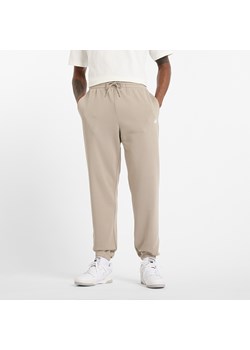 Spodnie męskie New Balance MP41519ADS – beżowe ze sklepu New Balance Poland w kategorii Spodnie męskie - zdjęcie 185753566