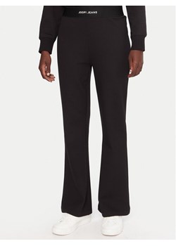 JOOP! Jeans Spodnie dresowe Tuvana 30048514 Czarny Relaxed Fit ze sklepu MODIVO w kategorii Spodnie damskie - zdjęcie 185761515