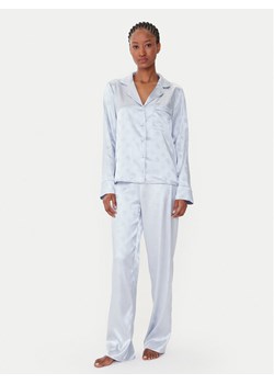 Guess Piżama O5BX05 W4732 Beżowy Regular Fit ze sklepu MODIVO w kategorii Piżamy damskie - zdjęcie 185768297