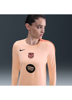 Damska dzianinowa koszulka piłkarska z półokrągłym dekoltem Nike Dri-FIT Total 90 FC Barcelona Strike (wersja trzecia) - Pomarańczowy ze sklepu Nike poland w kategorii Bluzki damskie - zdjęcie 185795748