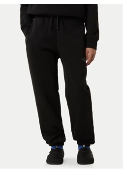 The North Face Spodnie dresowe NF0A8EAU Czarny Relaxed Fit ze sklepu MODIVO w kategorii Spodnie chłopięce - zdjęcie 185833649