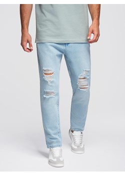 Spodnie jeansowe męskie CARROT FIT z przetarciami – jasnoniebieskie V1 OM-PADP-0250 ze sklepu ombre w kategorii Jeansy męskie - zdjęcie 185843535