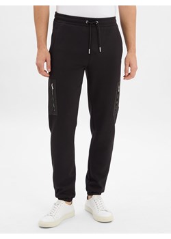 KARL LAGERFELD Męskie spodnie do biegania Mężczyźni czarny jednolity ze sklepu vangraaf w kategorii Spodnie męskie - zdjęcie 185851295