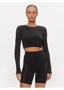 Calvin Klein Performance Koszulka techniczna 00GWS4K261 Czarny Slim Fit ze sklepu MODIVO w kategorii Bluzki damskie - zdjęcie 185869079