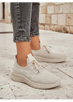 Aurelia Bianca – białe damskie sneakersy Royalfashion na płaskiej podeszwie ze sklepu royalfashion.pl w kategorii Buty sportowe damskie - zdjęcie 185885366