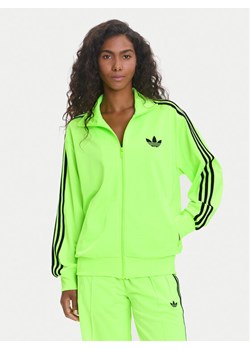 adidas Bluza adicolor Classic Firebird JX7859 Zielony Loose Fit ze sklepu MODIVO w kategorii Bluzy damskie - zdjęcie 185913727