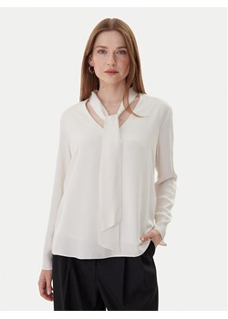 Armani Exchange Bluzka XW000732 AF16122 U1003 Écru Loose Fit ze sklepu MODIVO w kategorii Bluzki damskie - zdjęcie 185913898