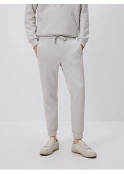 Reserved - Spodnie dresowe slim fit - jasnoszary ze sklepu Reserved w kategorii Spodnie męskie - zdjęcie 185930935
