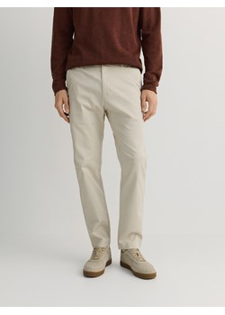 Reserved - Spodnie chino slim fit - złamana biel ze sklepu Reserved w kategorii Spodnie męskie - zdjęcie 185939816