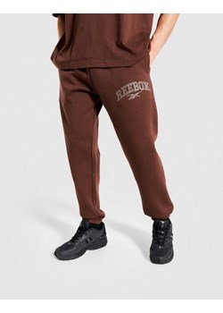 REEBOK SPODNIE PHILLIP VARSITY ze sklepu JD Sports  w kategorii Spodnie męskie - zdjęcie 185973295
