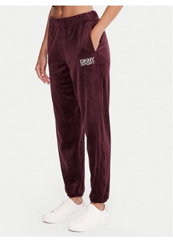 DKNY Sport Spodnie dresowe DP5P3702 Bordowy Regular Fit ze sklepu MODIVO w kategorii Spodnie damskie - zdjęcie 186029278
